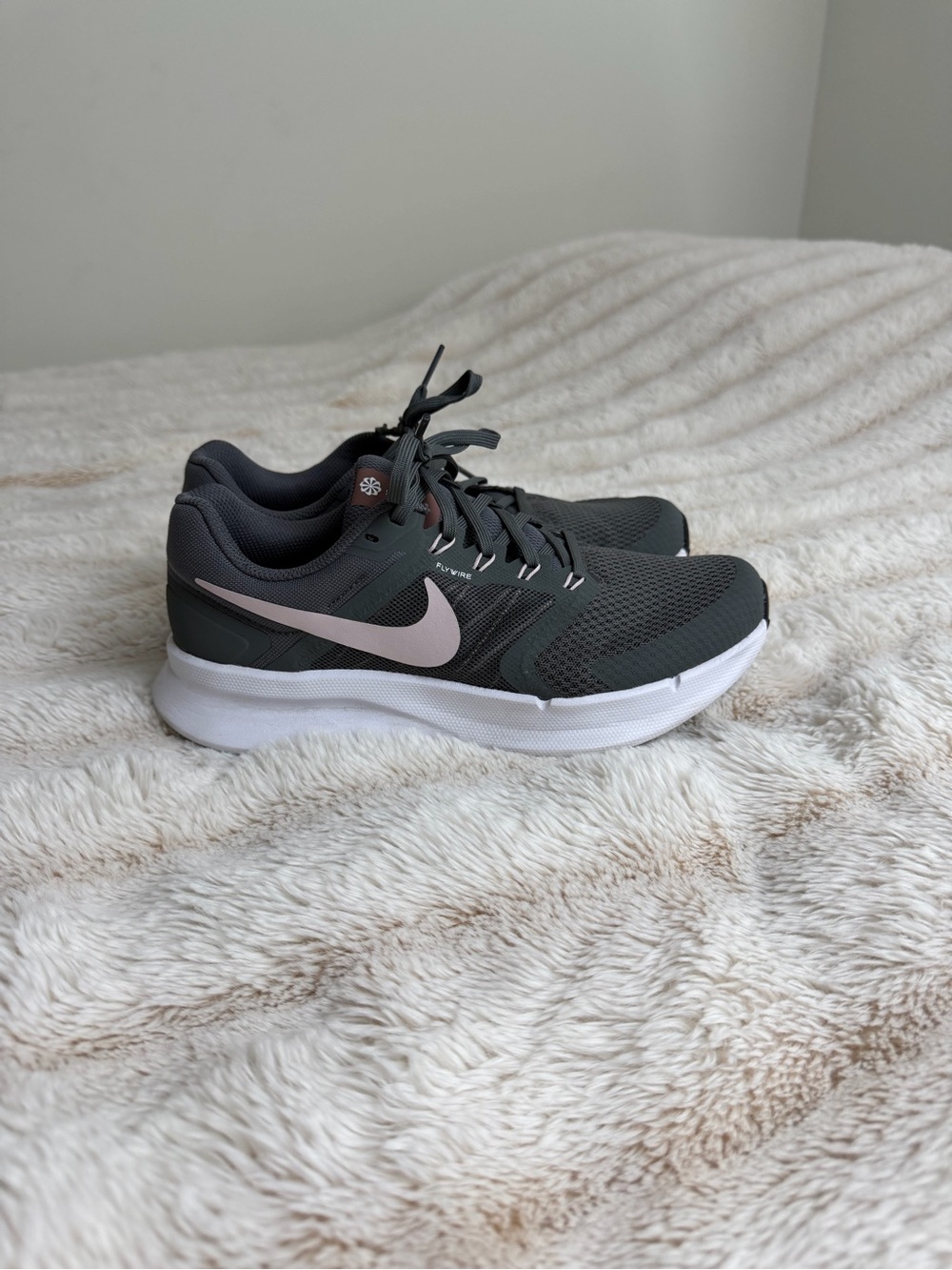 Nike Women's Dark Gray Running Shoes with Light Pink Swoosh
